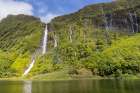 Azores, Portugal. Waterfall dropping into Lagoa dos Patos on Flores Island. Art Print